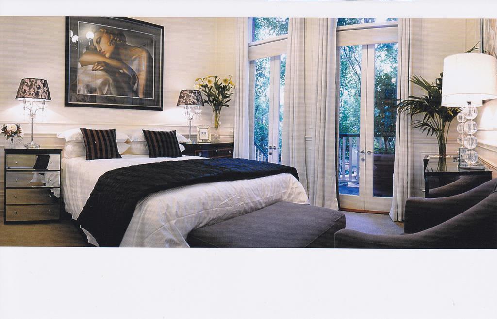 Aparthotel Andre'S Mews Melbourne City Exterior foto
